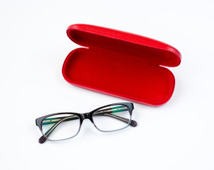 Glasses and red case on a white background