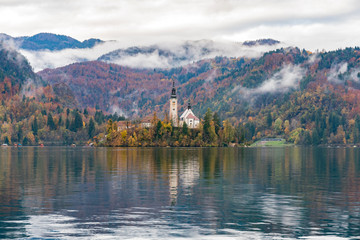 Beautiful autumn landscape around Lake Bled with Pilgrimage Church of the Assumption of Maria