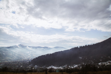 Obraz na płótnie Canvas Winter landscape in the Carpathian mountains with gutsul culture.