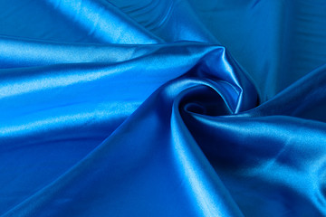 close-up view of piece of satin fabric. Minimal color still life photography