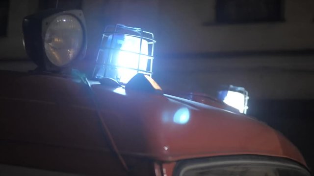 Red and blue blinking lights on top of the firetruck