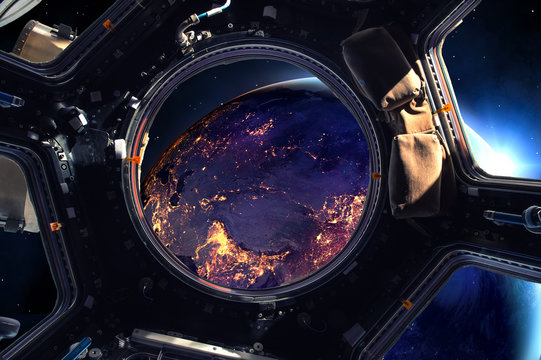 Earth and Spacecraft. Elements of this image furnished by NASA