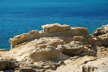 Fototapeta na wymiar Rock formation found at Lia beach in Mykonos, that make clear the effect of sea erosion