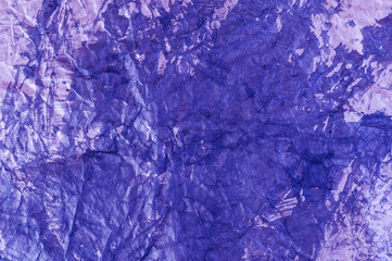 Grunge magenta paper texture. Crumpled old dirty cardboard distressed and industrial background.