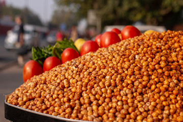 street food, nuts and tomatoes savoury snack