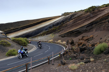 group of motorbikers on a mountain road