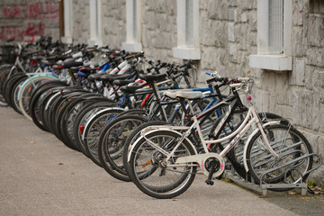 Bicycles parked and locked in different places in the center of the city of Vitoria-Gasteiz (Alava) Basque Country, Spain.