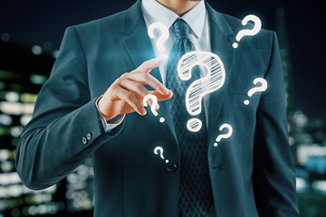 Double exposure of man hands with question marks. Consept of asking and searching information.