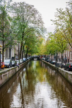 Amsterdam, Netherlands - September 27, 2011: One of the many bridges across Amsterdam canals. Amsterdam has more than 100 kilometres of canals, about 90 islands and 1,500 bridges. © DOUGLAS