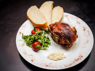 roasted pork knuckle with bread and horseradish