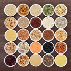 Dried vegan health food with  grains, nuts, seeds, sos mix, cereals, wholegrain pasta and legumes. Super foods high in antioxidants, anthocyanins, protein, vitamins and dietary fibre.