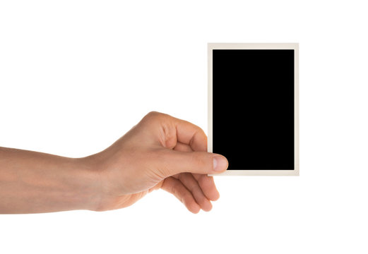 hand holding photo frame isolated on white with clipping path