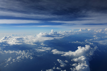 cloud with blue sky taken from airplane, dramatic clouds