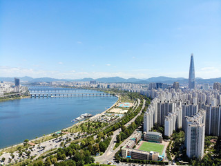 Aerial view cityscape of Seoul, South Korea. Drone View of Seoul with river and mountain. Seoul downtown city skyline, Aerial view of Seoul, South Korea, 08/20.2018