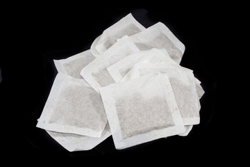 tea bag isolated on black background
