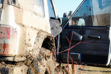 Ukrainian offroad competition in the city of Kamyanets Podilsky. Swamp and mud on cars. Produce large puddles