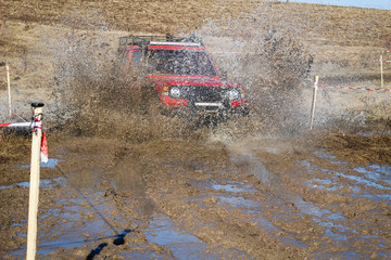 Ukrainian offroad competition in the city of Kamyanets Podilsky. Swamp and mud on cars. Produce...