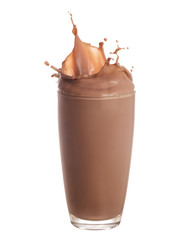 Chocolate milk splash out of glass., Isolated on white background.