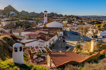 View of Guadix cave homes neighborhood seen from lookout balcony.