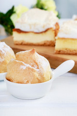 Eclair cakes filled with vanilla cream and traditional cheese cake.