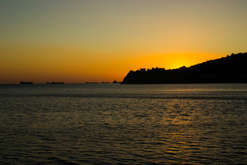 Naklejka premium sunset on the Black sea on a warm July evening