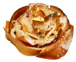 Rose of pancakes on the cake with cream close-up. Homemade delicious pastries isolated on white background.- Image