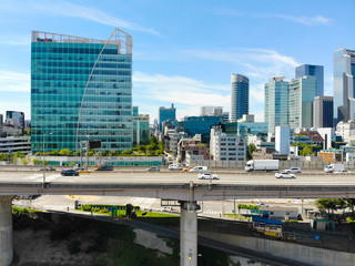 Aerial view of car driving on the bridge highway in Seoul, South of Korea. Side view of highway...