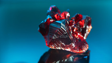 Natural raw red crystal. Natural red precious mineral stone