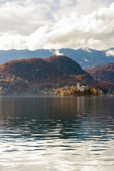 Beautiful autumn landscape around Lake Bled with Pilgrimage Church of the Assumption of Maria