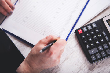 woman hand documents with calculator