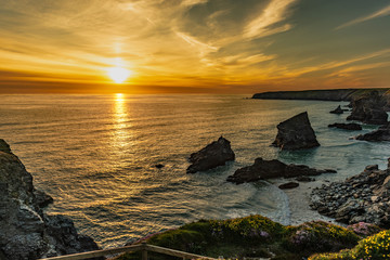 Beautiful dusk sunset of Bedruthan Steps rock stacks in Cornwall, UK