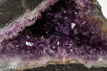 Amethyst Crystal Druse  macro mineral on white background
