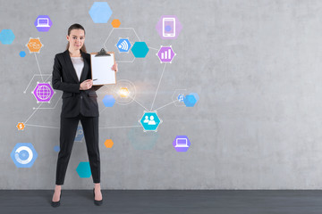 Businesswoman with clipboard, internet icons