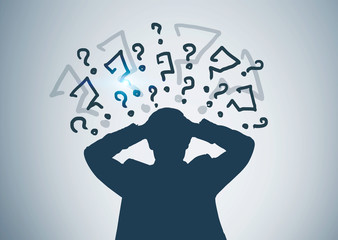 Silhouette of stressed businessman, question marks