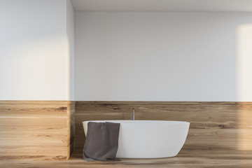 Fototapeta na wymiar White and wooden bathroom with tub