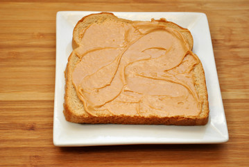 Peanutbutter Spread on Wheat Bread