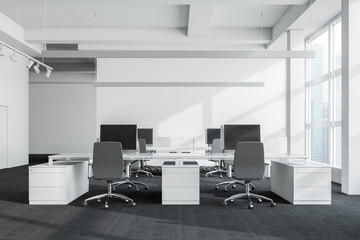 White open space office interior with lamps