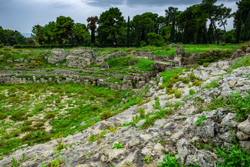 Fototapeta na wymiar Roman arena for gladiators fights in Syracuse, ruins in Archeological park