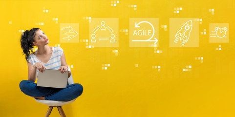 Agile concept with young woman using a laptop computer 