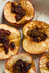 Baked apples with cinnamon and cranberries