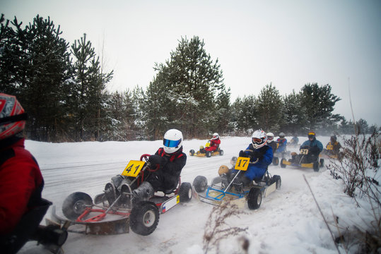 Go-cart race on snowy track 