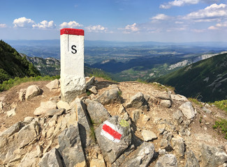 The border post is high in the mountains. Border of Poland and Slovakia in the Tatra Mountains. Tourist route. 