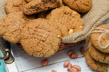 Peanut cookies on a homespun cloth with Peanut and cookies. No shugar added. Peanut butter. Peanut butter bakery.