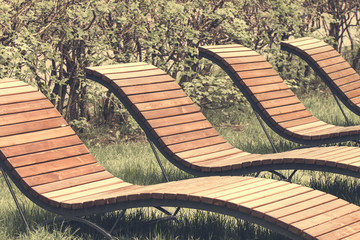 Spring loungers for relaxing in a public park toning