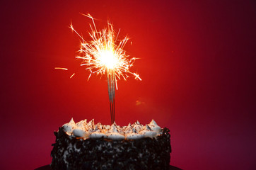 Cake for first birthday, number one made of sugar on top with stars around it.