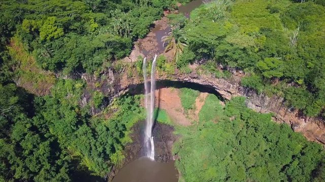 Chamarel waterfall in Mauritius. Flight above waterfall.