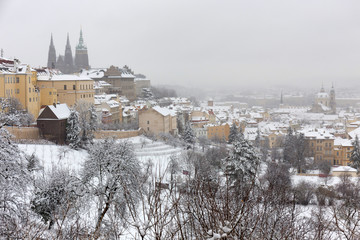 Obraz premium Snowy Prague City from Hill Petrin, Czech republic