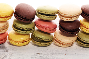 Sweet and colourful french macaroons or macaron on white background