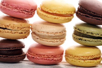 Sweet and colourful french macaroons or macaron on white background