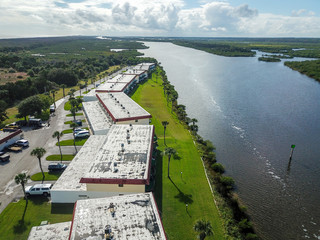 Business Buildings in a Row on the Riverfront Aerial Drone Shot Nature Outdoors Daytime Landscape